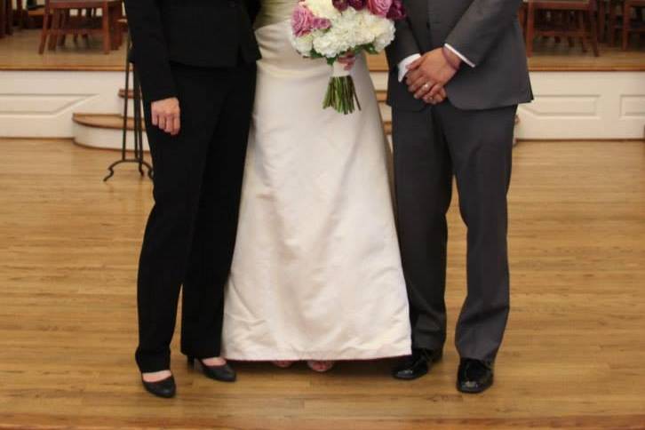 Newlyweds and the officiant