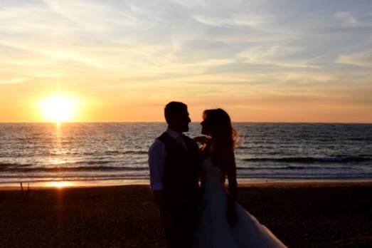 Newlyweds at sunset