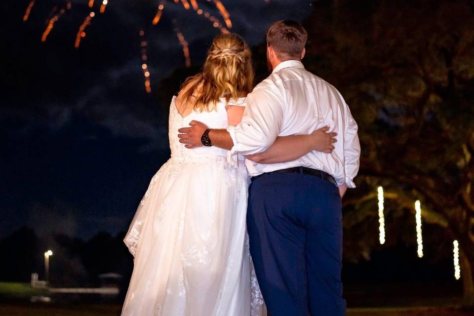 Ceremony spot under the oaks.