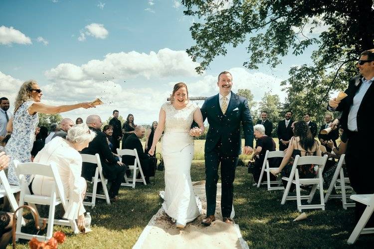 Walking down aisle.