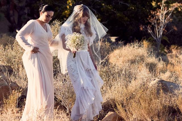 Chris & Ashley - Pioneertown - strolling through field