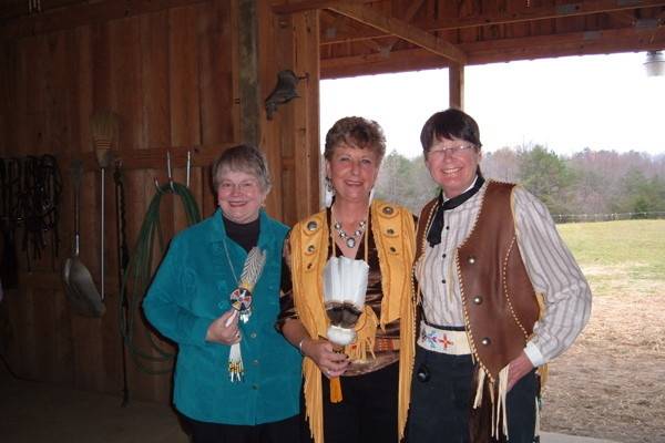 Posing with the wedding officiant