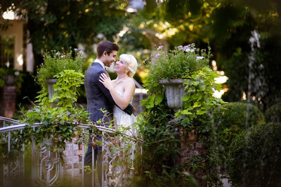 Posing over a bridge in the garden