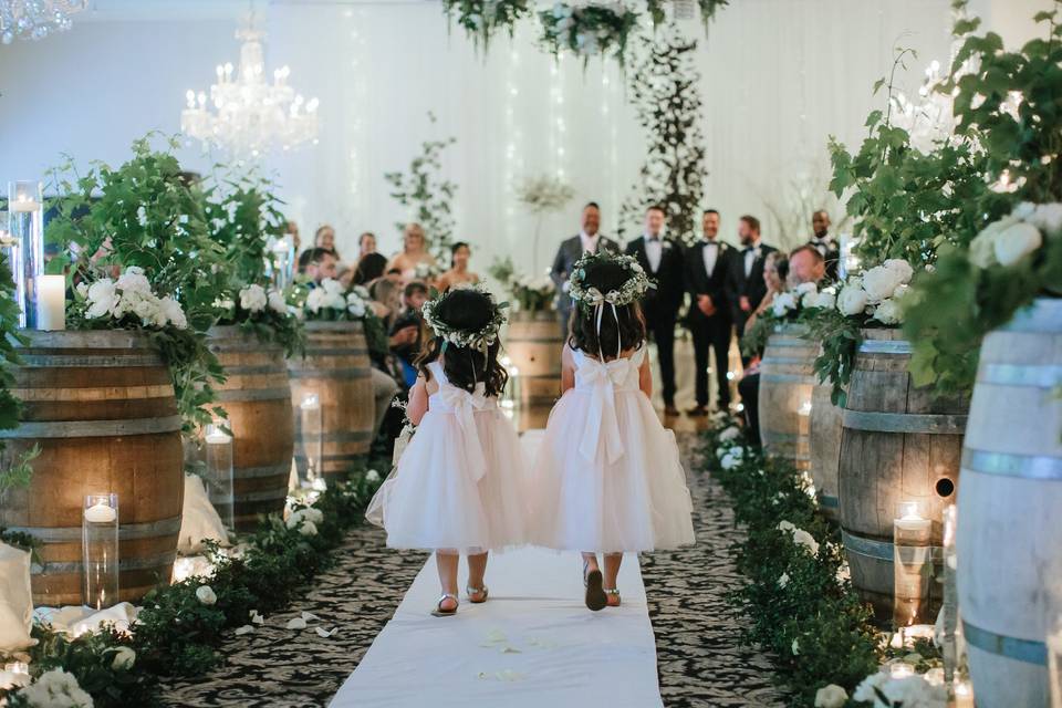 Children walk down the aisle