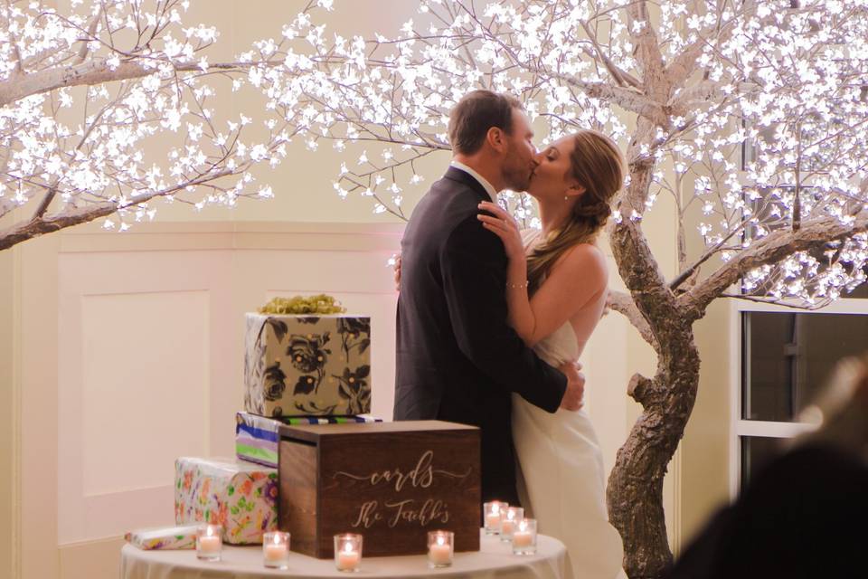 Kiss under fairy lights