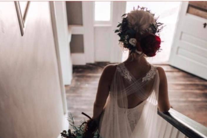 Bride's dress flowing on the stairs