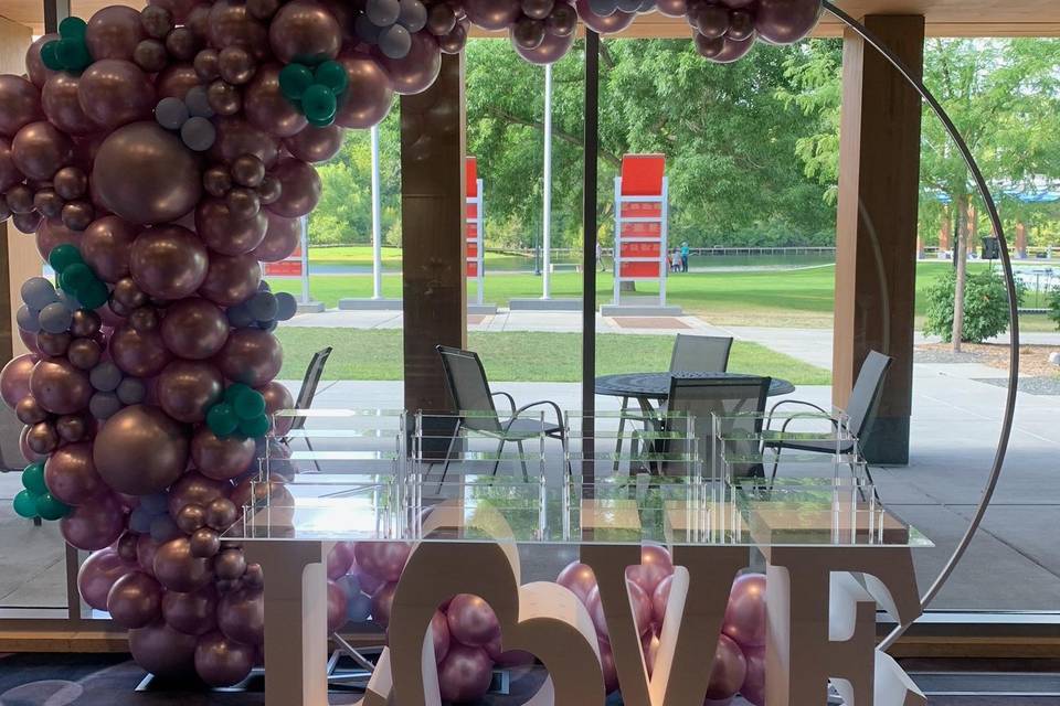 Balloon arch dessert table