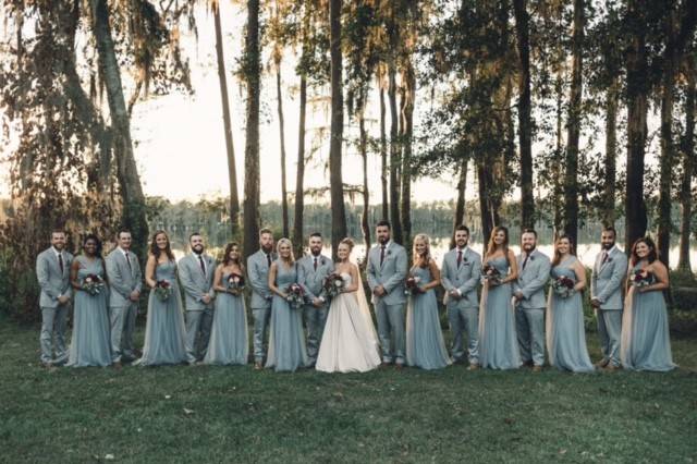 The couple with the bridesmaids and groomsmen