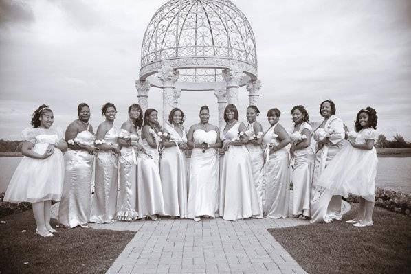 Jeri, her matron of honor, bridesmaids, and flower girls