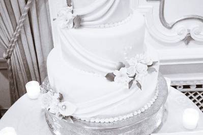 A Three Layer Wedding Cake at Kelly & Charles' Reception