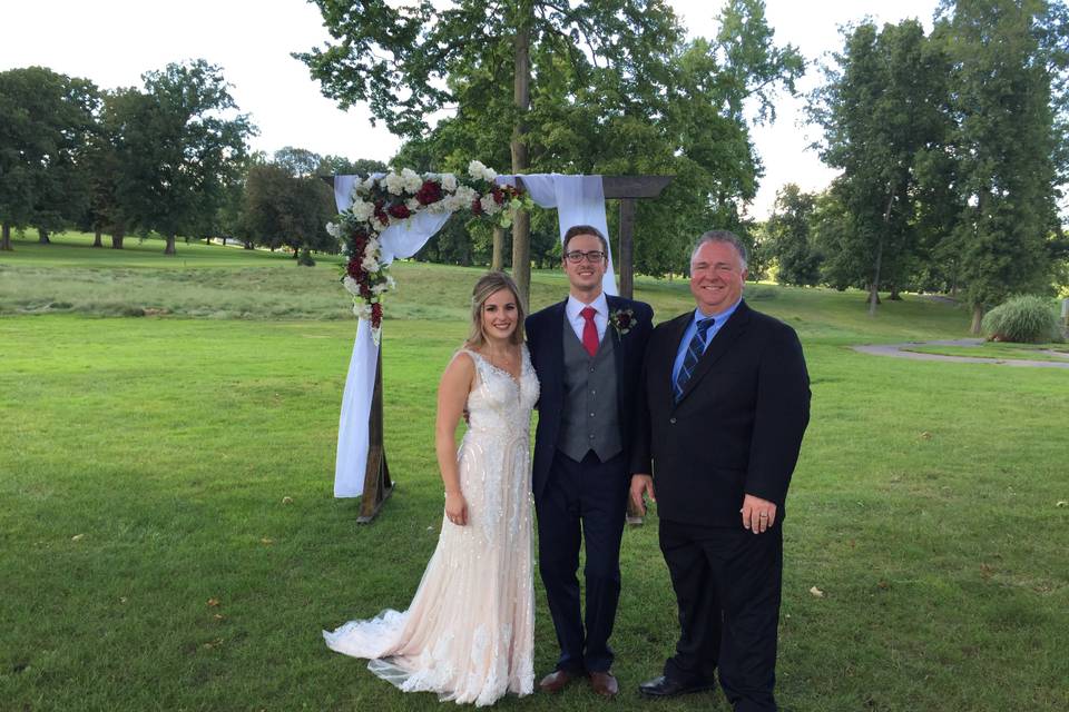 Newlyweds with the reverend