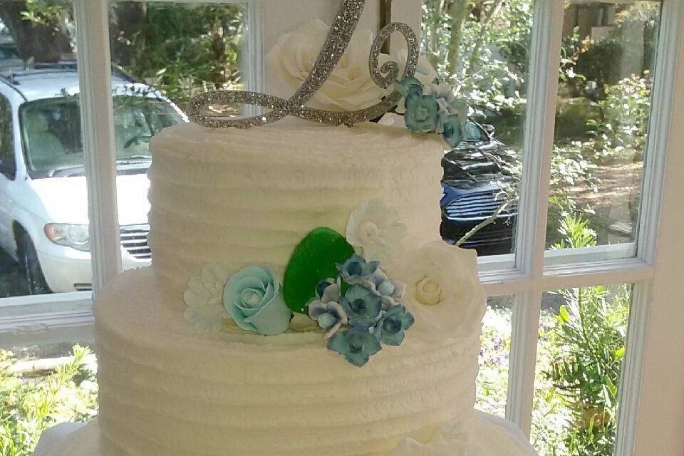 Three Tiered Buttercream Rustic Wedding Cake, with Sugar Paste Flowers.