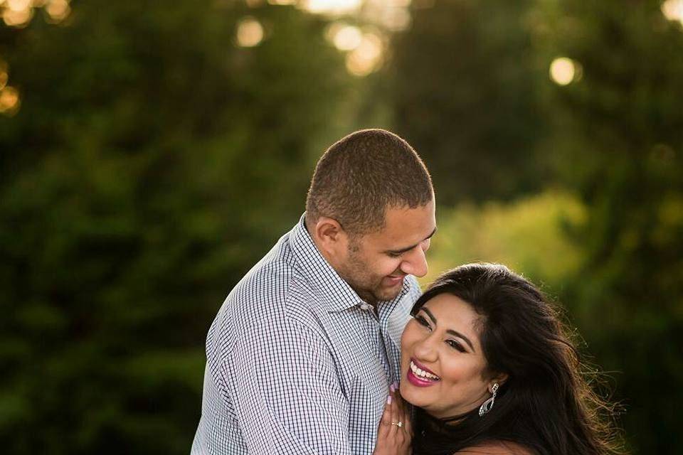 Groom hugging his bride