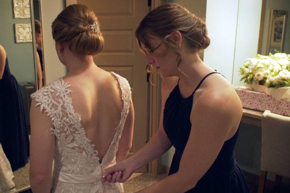 Zipping the dress