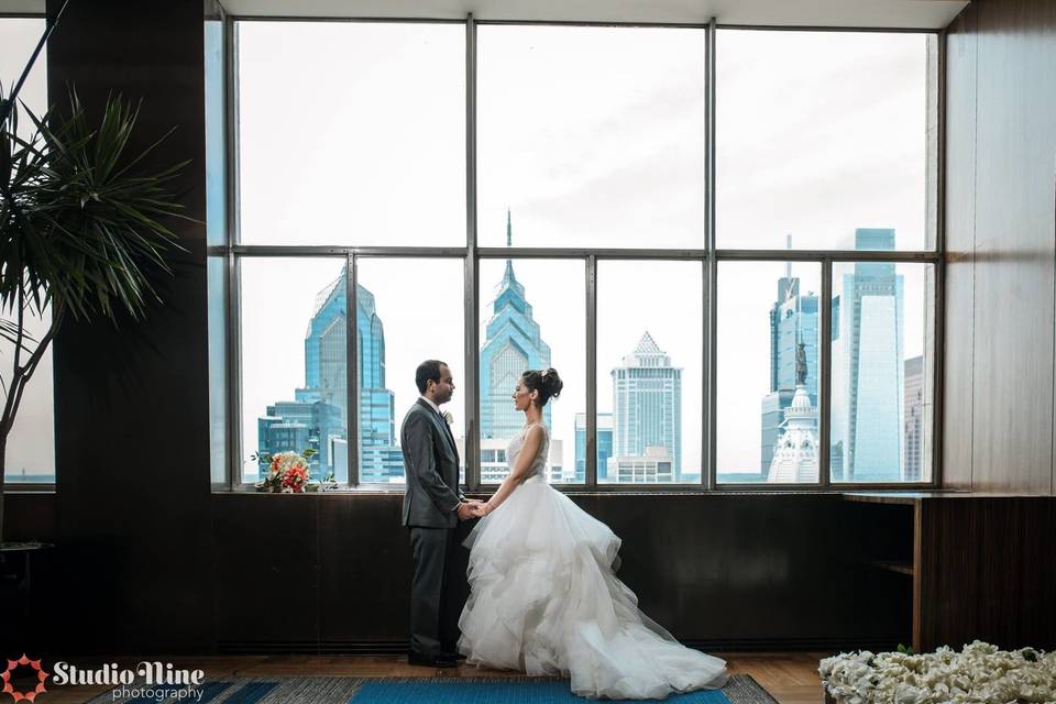 Newlyweds and the view of the city skyline