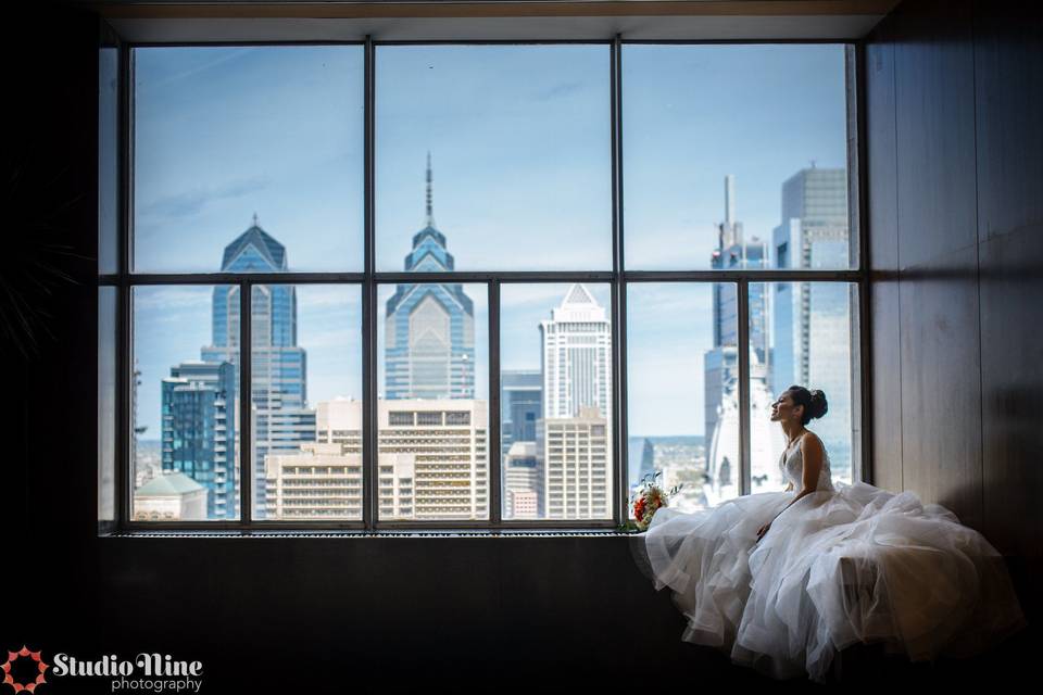 Bride looking out the window