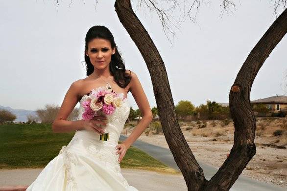 From a photo shoot for Las Vegas Bride Magazine. Model is Andrea Troussaint. Dress by Tux One. MUA by OneLuv. Location is TPC The Canyons.