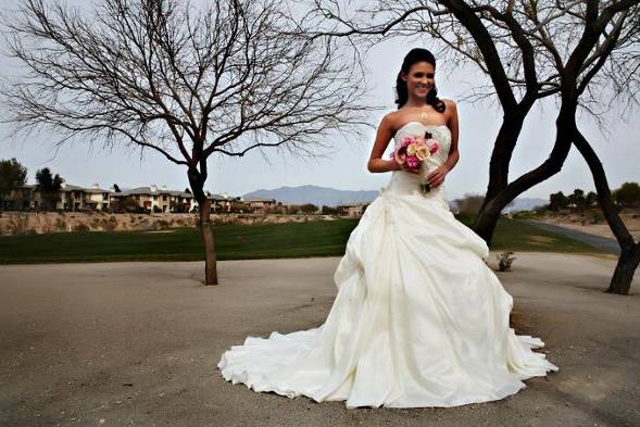 From a photo shoot for Las Vegas Bride Magazine. Model is Andrea Troussaint. Dress by Tux One. MUA by OneLuv. Location is TPC The Canyons.