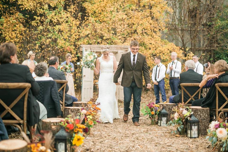 Newly-weds walking down the aisle