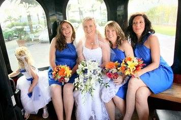 Bride, bridesmaids, and flower girl