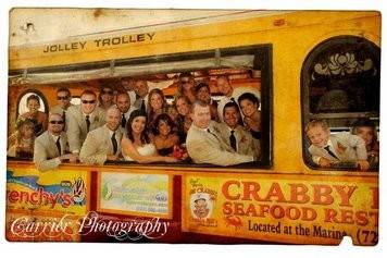 Newlyweds and their guests in the Jolley Trolley
