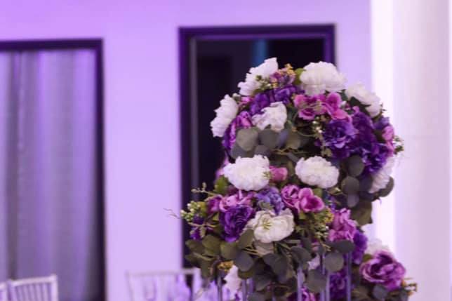 Tables with floral centerpieces