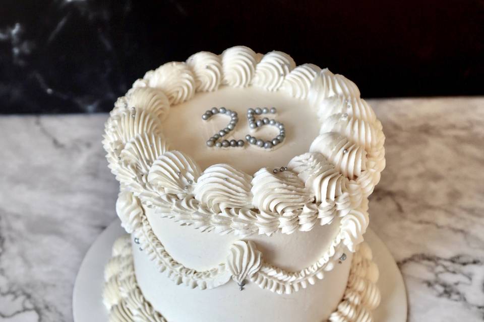 All white Anniversary Cake