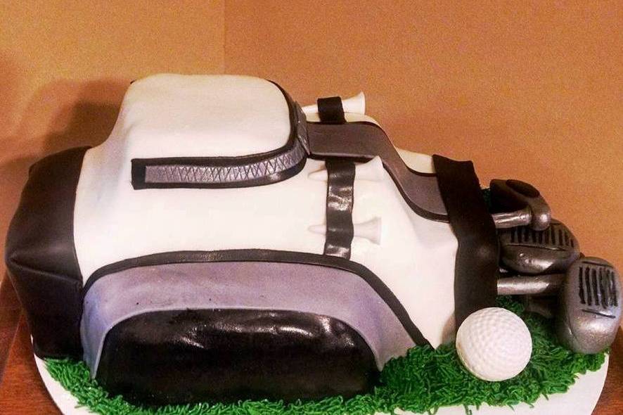 Sculpted Golf Bag Cake with edible golf clubs, tees and piped grass