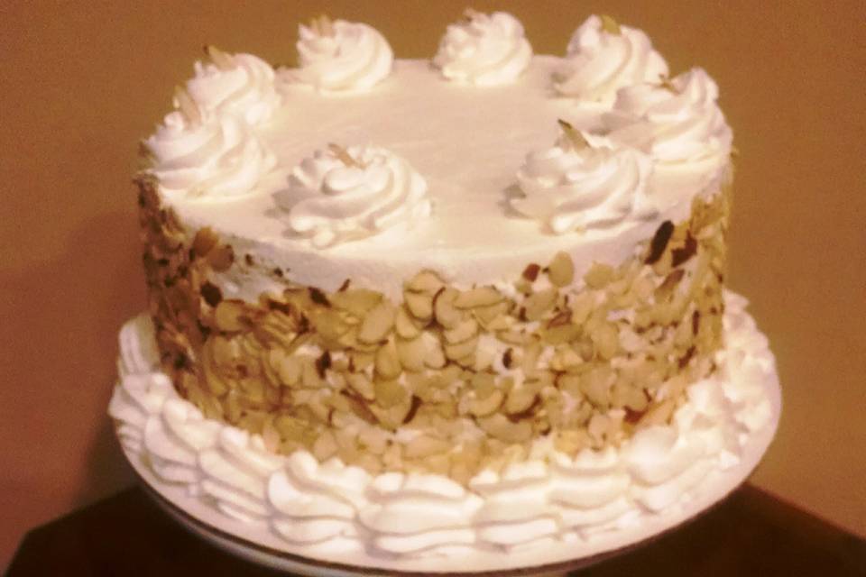 Amaretto Cake.  Almond cake infused with Amaretto liquor, almond buttercream and sliced almond garnish