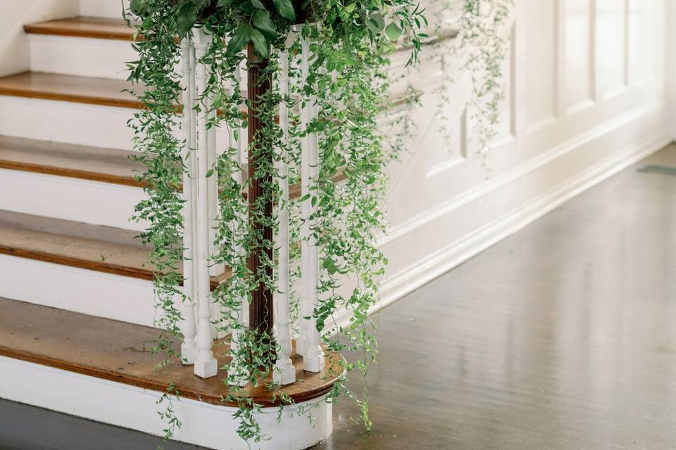 Staircase with hanging smilax