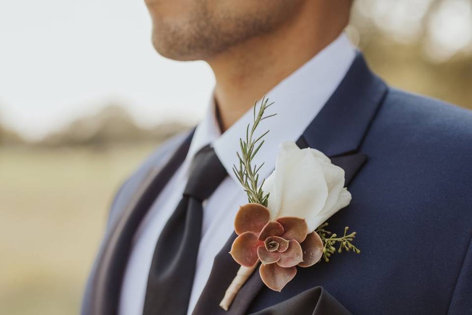 Rose and succulent boutonniere