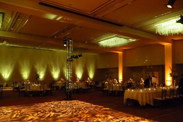 Your dancefloor can pop an even your uplighting can have texture!  And why not spotlight the chandeliers?