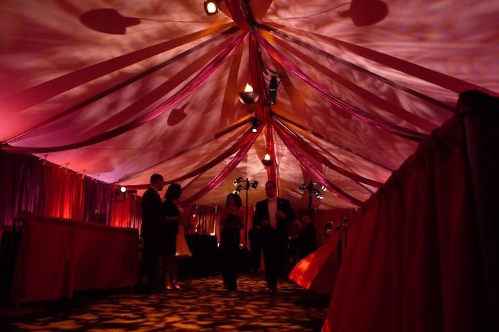 We took the ceiling patterns out of focus for a soft, undulating texture, giving this outdoor tent event a sumptuous look.