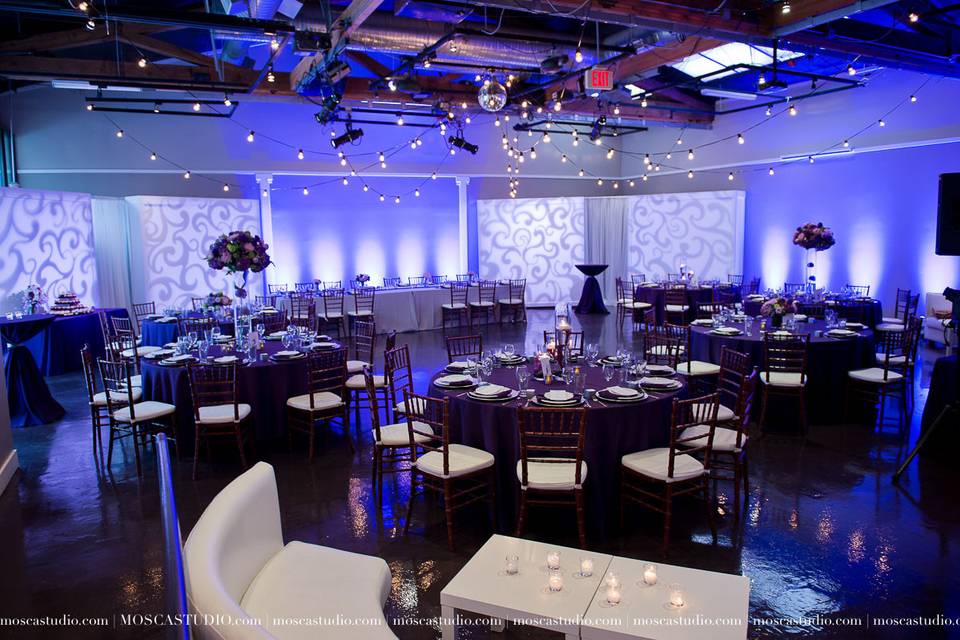 We love Urban Studio in Portland!  So much we can do in this space, and this is one of our most popular combinations of treatments, including cafe strings overhead, framed gobo projections on their portable museum walls, and precise uplighting on the building walls.  With so many options for pattern and color, this venue never looks the same twice!