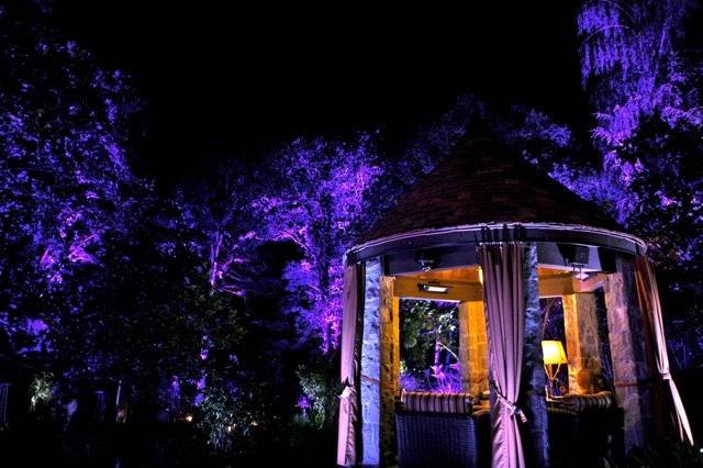 A wonderful Gazebo nestled into a beautiful oak and fir forest at this amazing estate wedding!  We created a warm, cozy environment for this elegant outdoor reception!