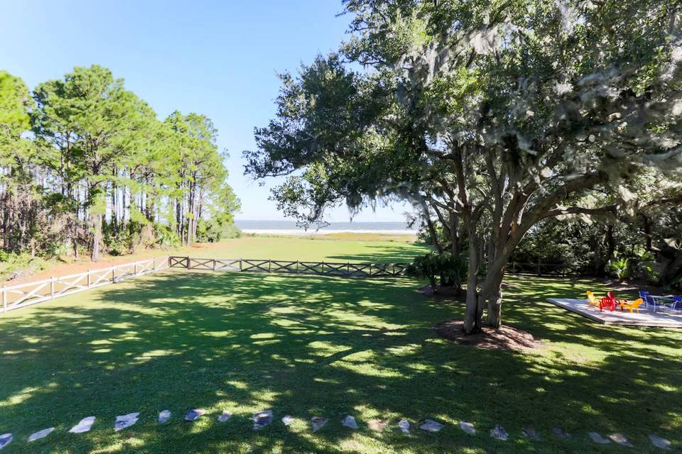 Lawn and oak trees in backyard