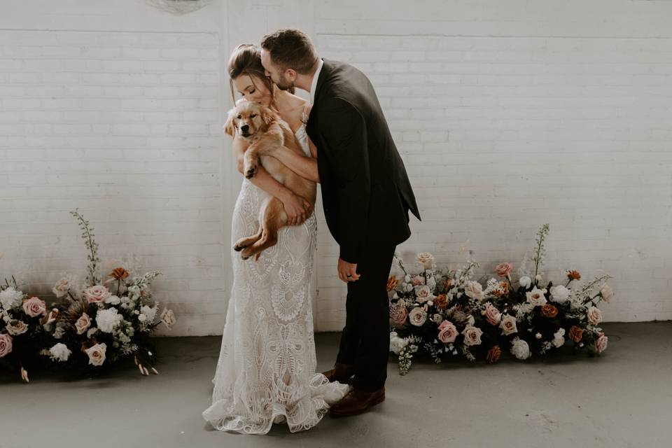 Bridal portrait with puppy