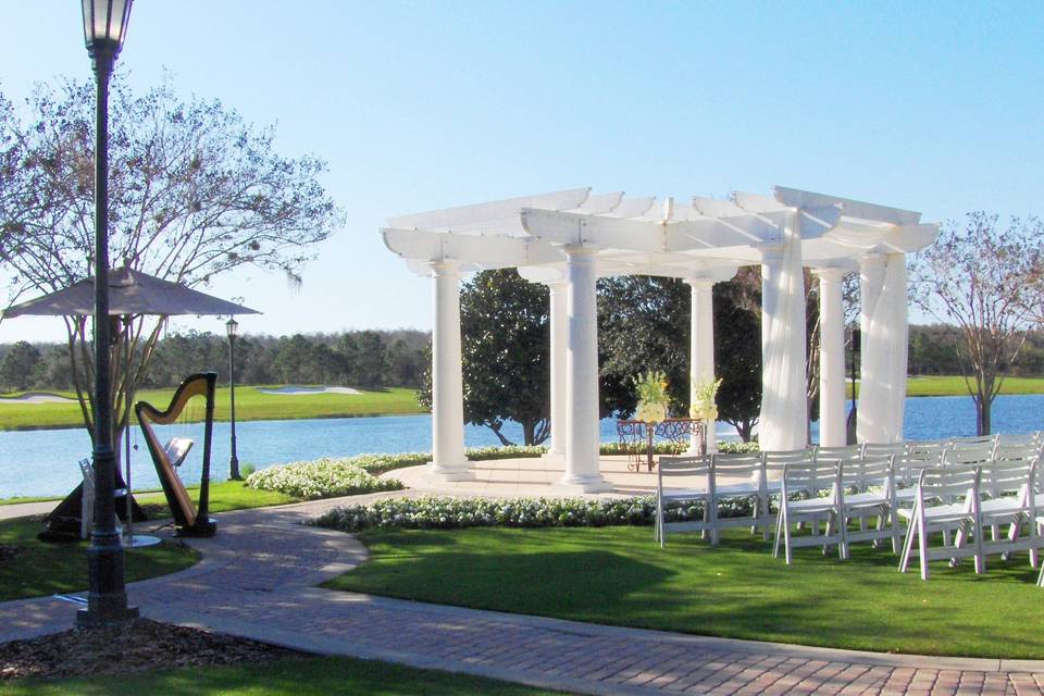 Waterfront gazebo wedding setup