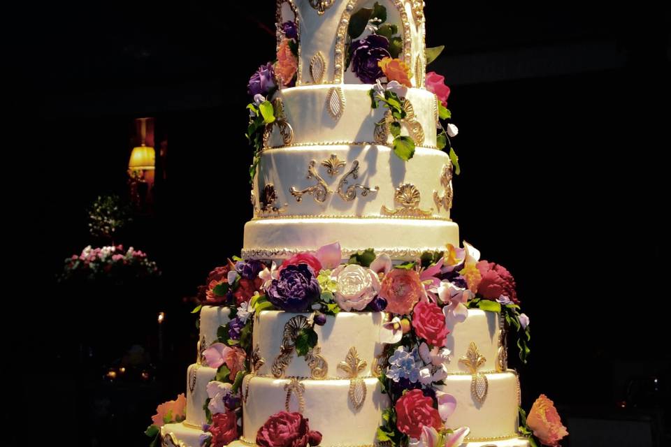 Tall wedding cake with floral design