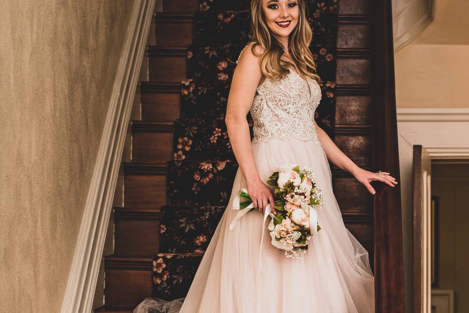 Bride on the Mansion Stairs