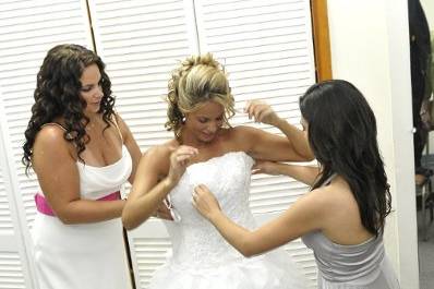 Me helping the bride with her dress