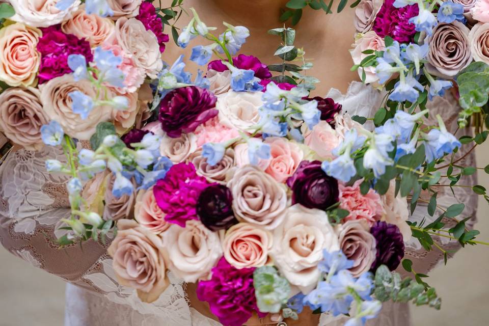 Bride surrounded by flowers