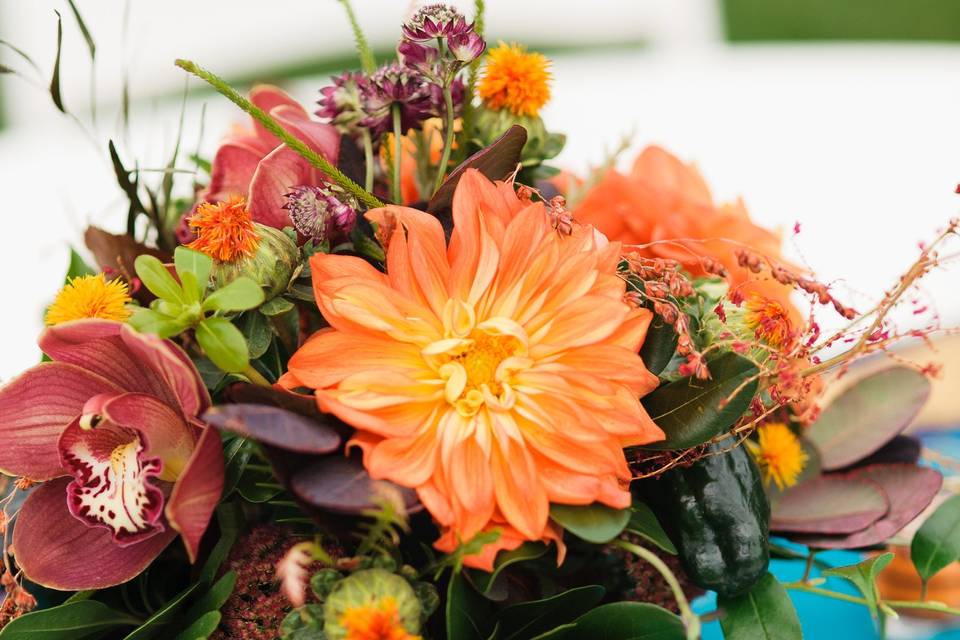 Orange themed floral arrangement