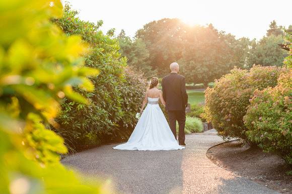 Couple leisurely walk hand in hand​