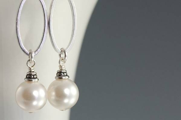 Long white pearl earrings