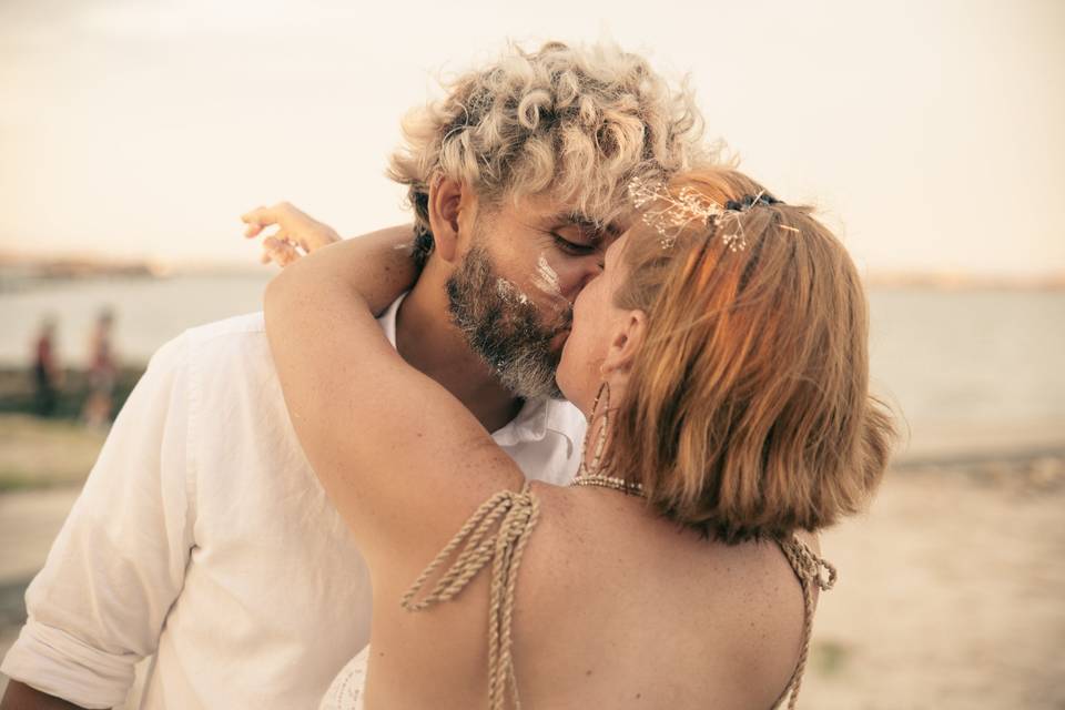 Sunset kiss by the water