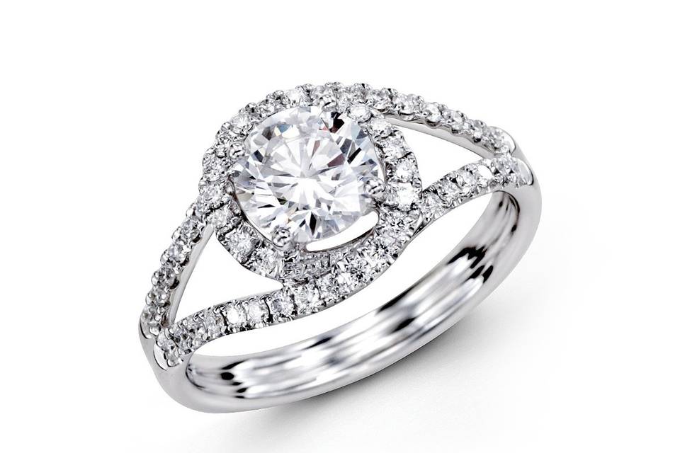 Style CR131<br>
This gorgeous 18K white engagement ring is comprised of .35ctw round white Diamonds.