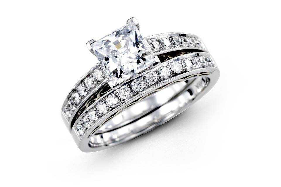 lp1208
This gorgeous 18K white engagement ring and band is comprised of .44ctw round white Diamonds.