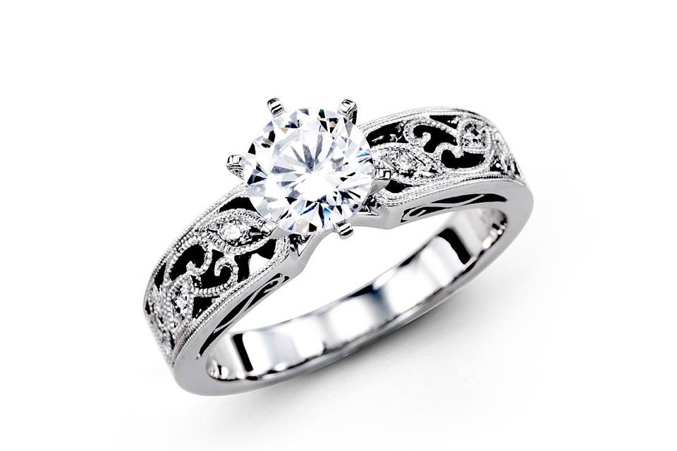 lp1355
This gorgeous 18K white engagement ring is comprised of .07ctw round white Diamonds.