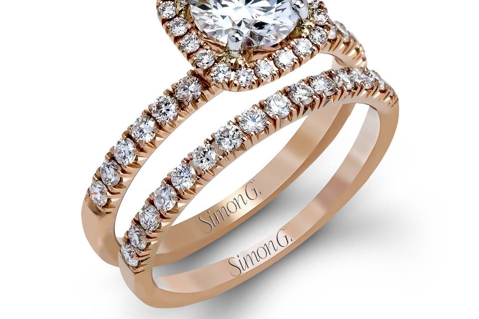 Style	MR2132	<br>	18K rose gold set comprised of 0.78ctw round white diamonds.